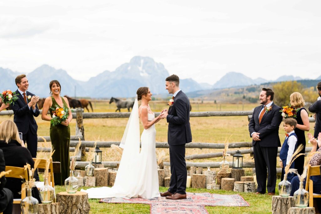 Diamond Cross ranch Wedding ceremony with horses released into pasture