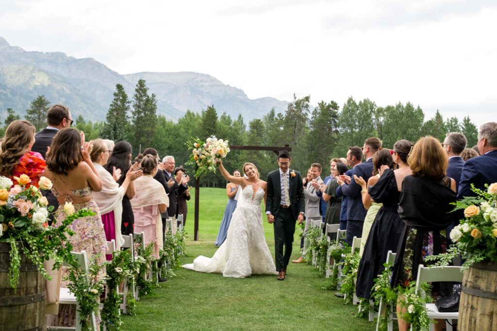 bride and groom celebrate wedding