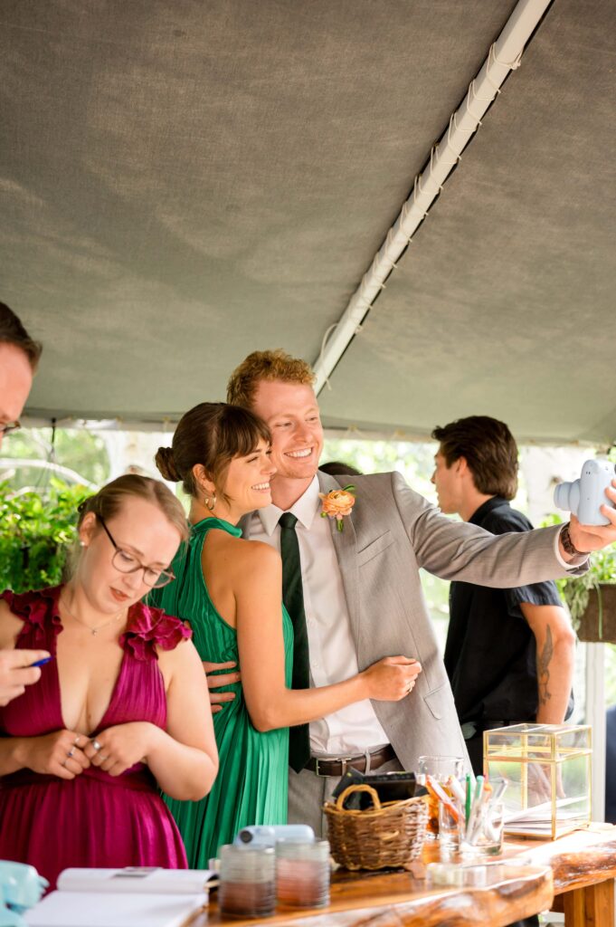 couple takes selfie at wedding