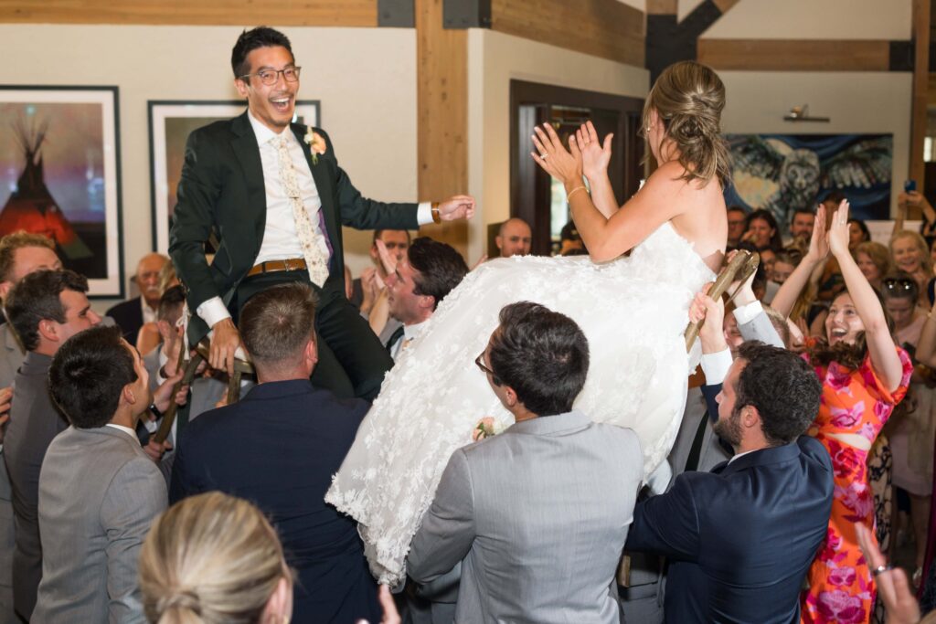 bride and groom dancing to Hora