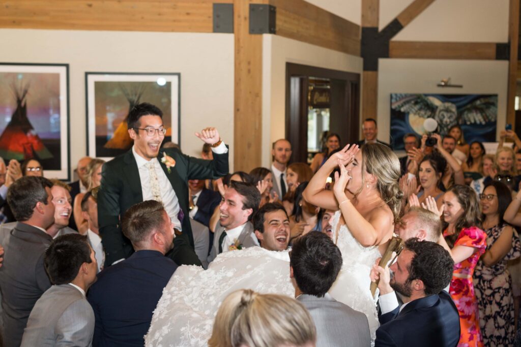 bride and groom dancing to Hora