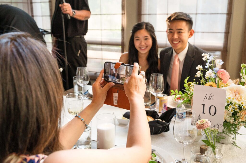 wedding guests take photo