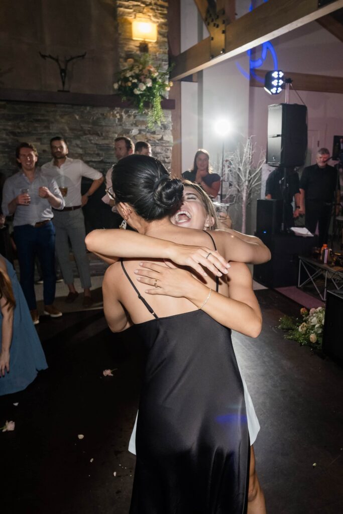 bride hugs friend