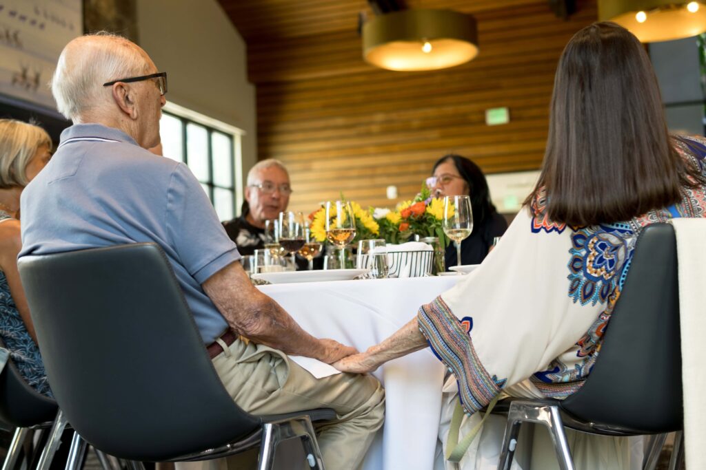 guests holding hands 