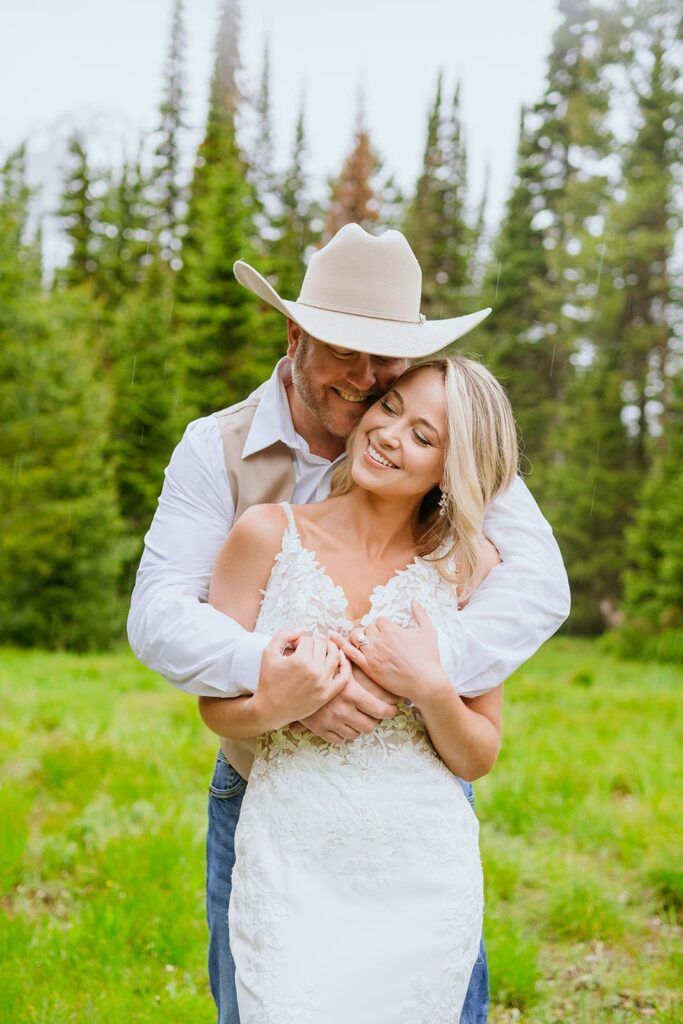 bride and groom hug grand teton wedding portraits