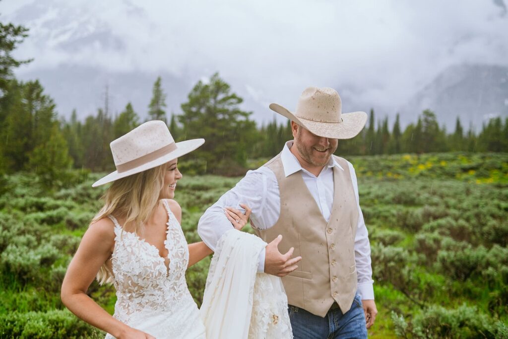 bride and groom walking grand teton wedding portraits