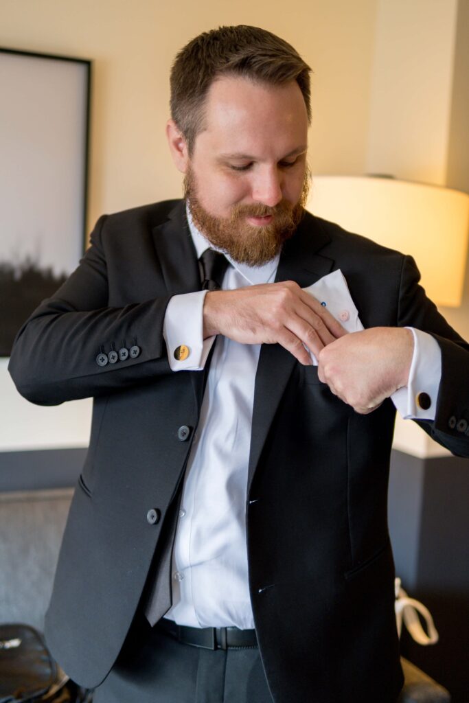 groom getting ready for his elopement