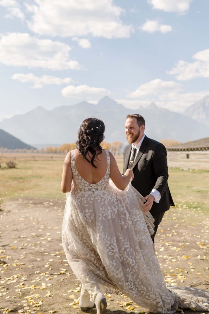 bride and groom laughing together