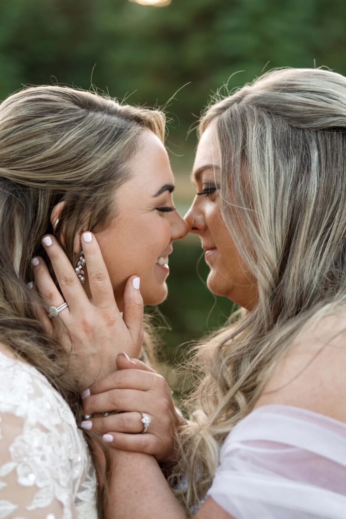 brides smiling together