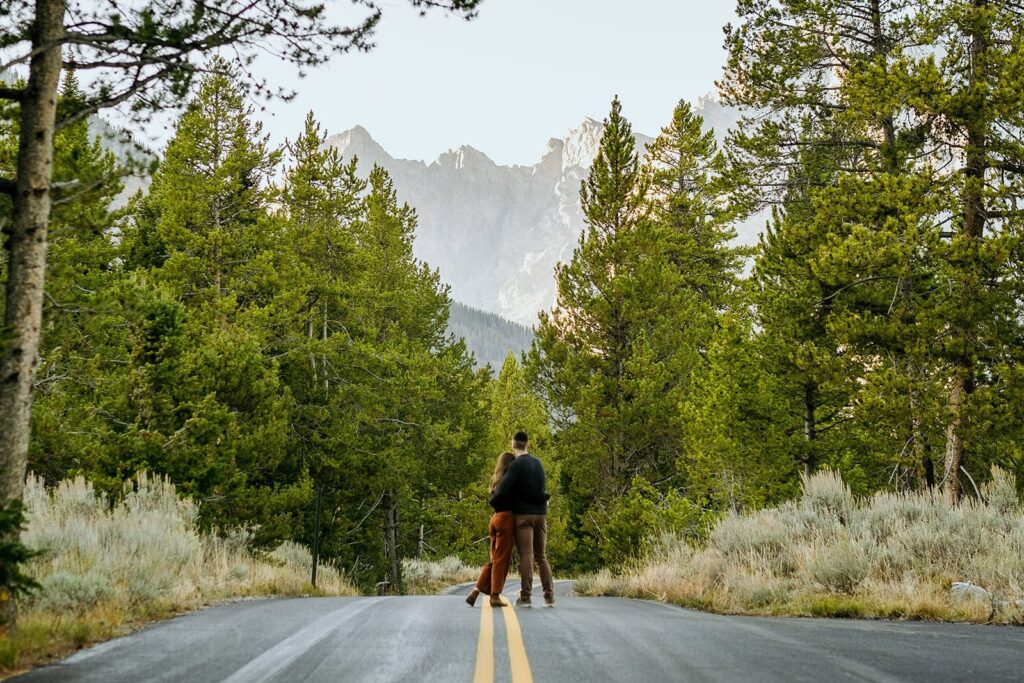 Couple standing in a road for their engagement photos