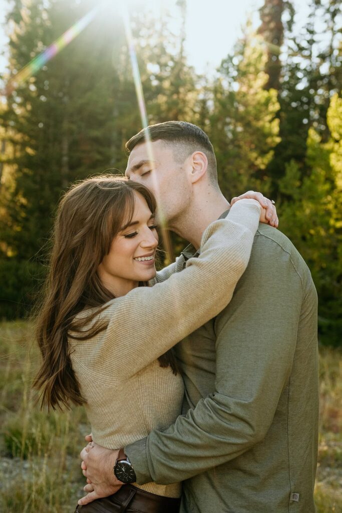 couple sharing a kiss for their engagement photo session