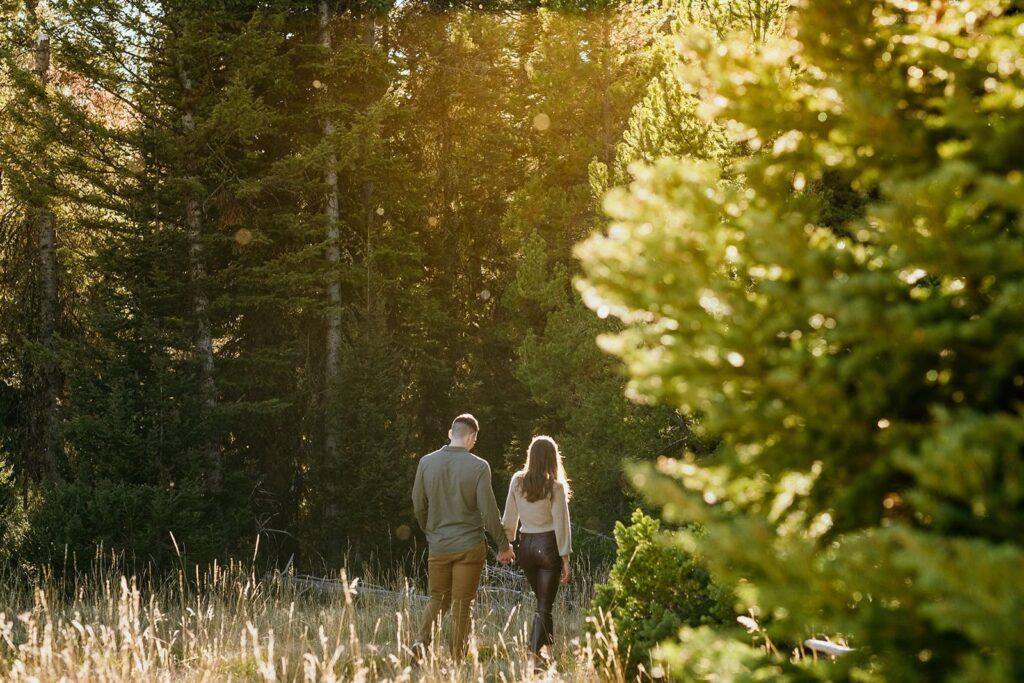 Couple walking in forrest 