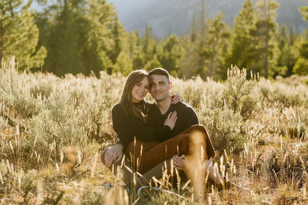 Couple sitting in sage brush