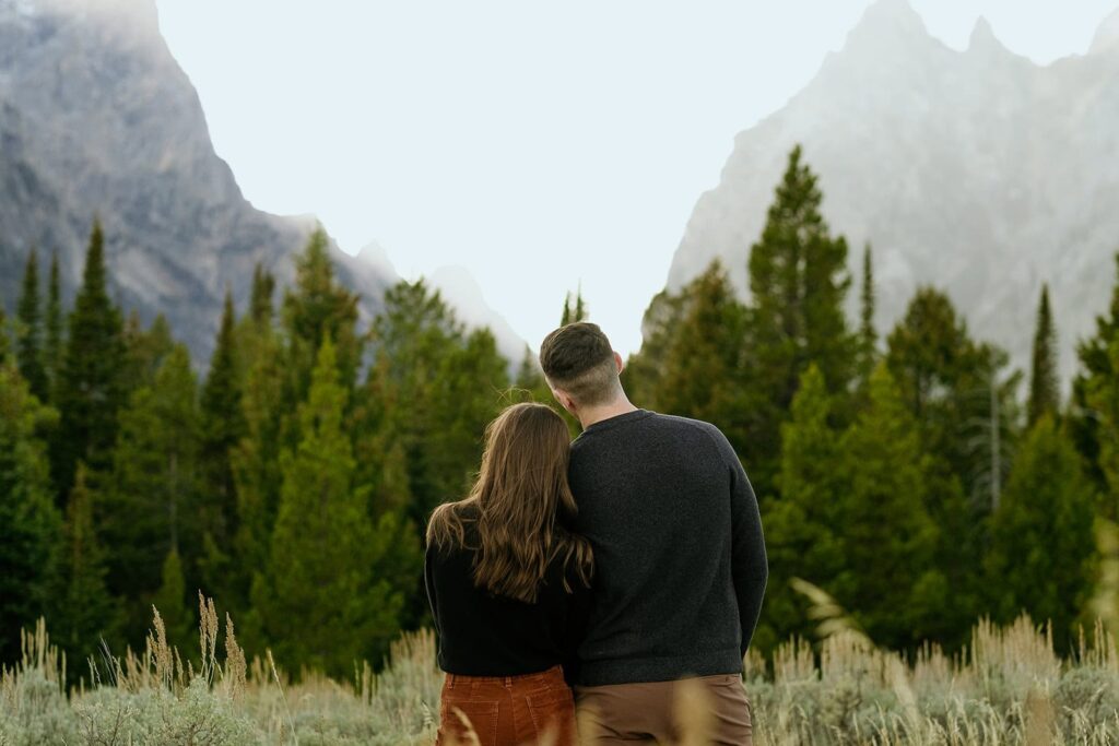 Couple enjoying the view of the Grand Tetons